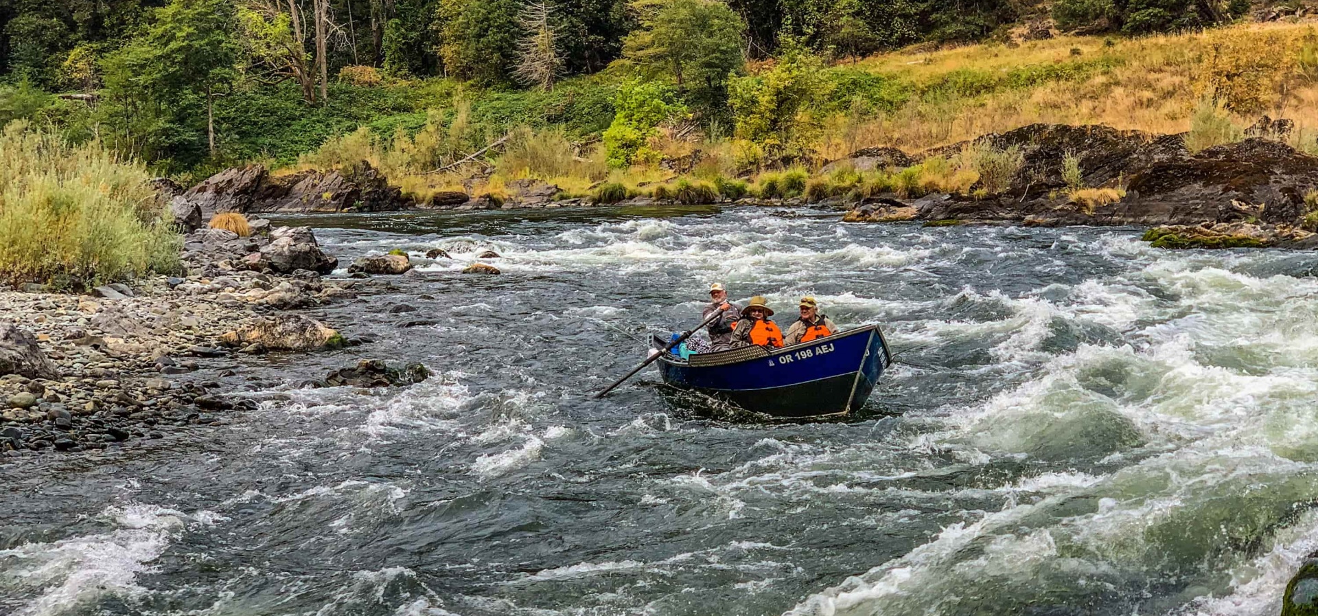 Rogue river drift boat at horse shoe bend rapid